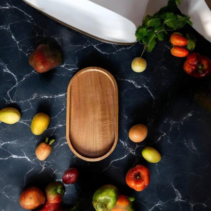 Wooden Oval Serving Tray on Marble Countertop